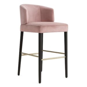 Blanco barstool in blush velvet with a curved back, black legs and a brass footrest.